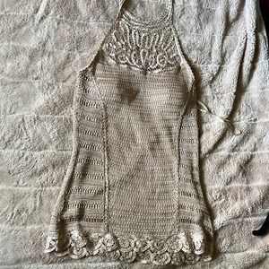 Beautiful detailed nude halter knit top